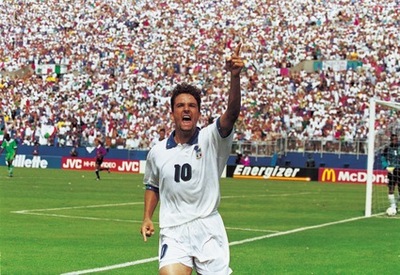 5 Jul 1994: Roberto Baggio of Italy celebrates scoring the winning goal during the FIFA World Cup Finals 1994 second round match against Nigeria played at the Foxboro Stadium, in Boston, Massachusetts. Italy won the match 2-1 after extra-time. Mandatory Credit: Rick Stewart /Allsport